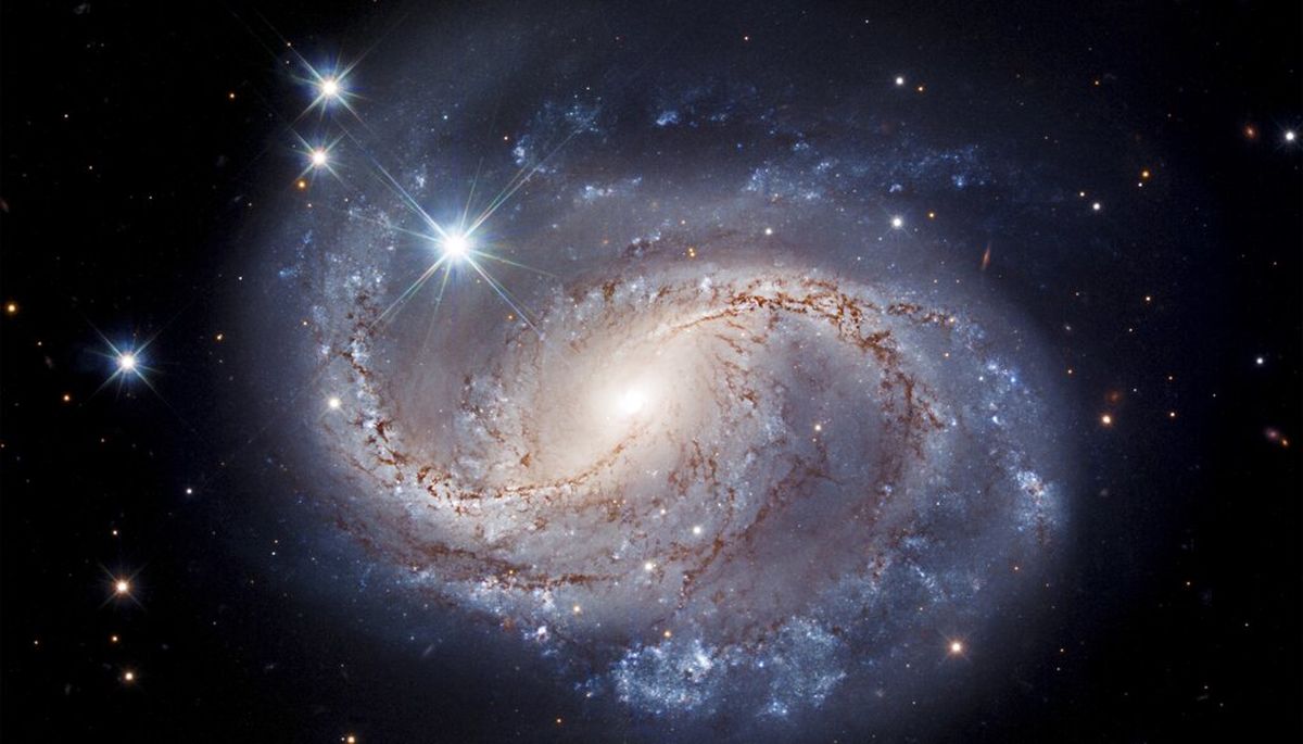 تصویر کهکشان مارپیچی راز سرعت انبساط جهان را فاش می‌کند