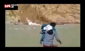 تجلیل از معلم جوانی که دانش آموزان را از رودخانه عبور می داد