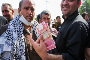 اولین تجربه برای بانکهای ایران در جایگزینی دینار به جای دلار در مراسم اربعین به همت بانک ملی ایران