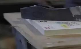 آزمایش کتاب و تبر