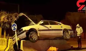 عکس عجیب پژو روی دیوار بتنی +عکس