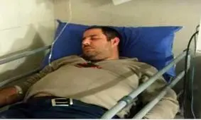 کتک زدن یک عکاس توسط عوامل سازنده برجی که امروز در تهران آتش گرفت+ عکس