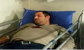 کتک زدن یک عکاس توسط عوامل سازنده برجی که امروز در تهران آتش گرفت+ عکس