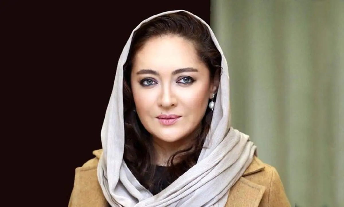 نیکی کریمی در کنار علی دایی روی نیکمت