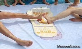 مسابقه خنده دار و دیدنی کشتی با انگشتان پا + تصاویر