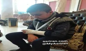 تصویری از تنبیه بدنی دانش آموز توسط معلم در همدان