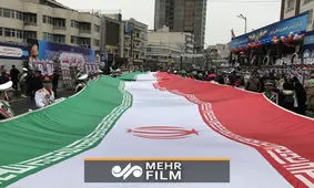 بارش باران هم اکنون در راهپیمایی ۲۲ بهمن تهران