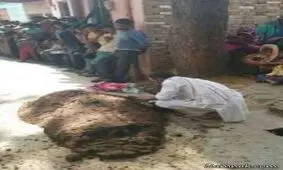 دفن زن زیر کوه مدفوع توسط شوهرش + عکس