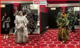 با برگزارکننده نمایش مد و لباس مختلط برخورد می‌شود