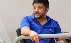 سرقت نافرجام از منزل علیرضا دبیر، رئیس فدراسیون کشتی/ دستگیری 2 سارق در ولنجک

