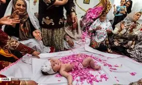 آیین گل‌غلتان نوزادان در امیریه+ عکس