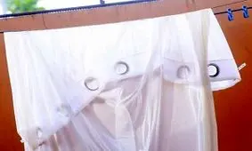 ساده‌ترین راه شستن پرده در خانه