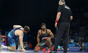 انتقاد تند مربی کشتی فرنگی: چرا قهرمان المپیک را کنار گذاشتند و یک غایب را آقای ورزش کردند؟!