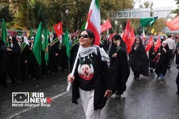 انتشار تصویر خانم بدون روسری در رزمایش جانفدایان ایران در خبرگزاری صداوسیما