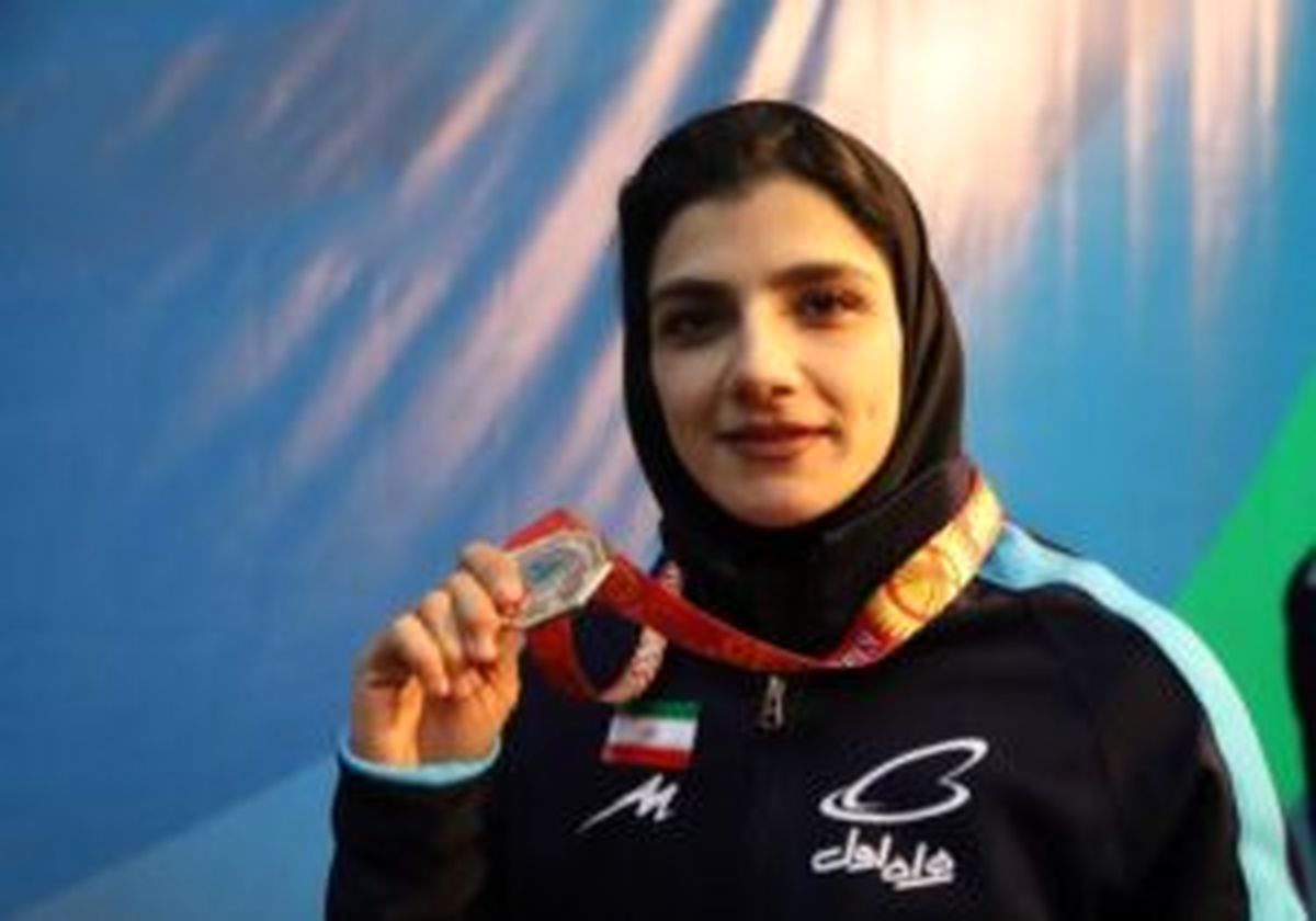 قهرمانی دختر کشتیگیری که به قولش وفا کرد