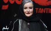 قابی از نعیمه نظام‌دوست و رضا نیکخواه در یک مراسم 
