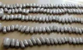 بلعیدن مواد مخدر، قاچاقچی را تا یک قدمی مرگ کشاند

