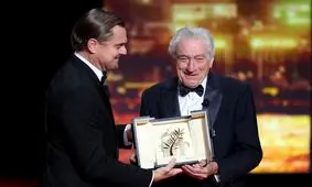 نخل طلای افتخاری جشنواره کن توسط دی‌کاپریو به رابرت دنیرو اهدا شد/ ویدئو