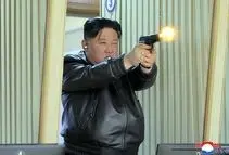 جیمز باند تپل! | تصویر عجیب کیم جون اون در حال شلیک با اسلحه