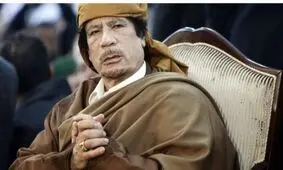 تصویری جالب از زیباترین بادیگارد معمر قذافی/ عکس