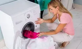 دلیل سفیدک زدن لباس در ماشین لباس‌شویی