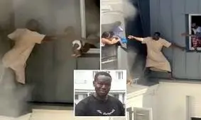 مردی در میان زمین و هوا کودکان را از دل آتش نجات داد/ ویدئو