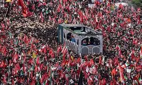 طواف هوایی پیکر رهبر شهید در حرم حضرت معصومه (س) و انتقال به تهران