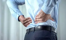 چرا کمردرد می گیریم؟