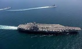 تنش دریایی اوج گرفت؛ شلیک ناو هواپیمابر آمریکا به پهپاد ایرانی / ایران پهپادی دیگر اعزام کرد/ عکس