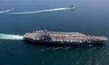 تنش دریایی اوج گرفت؛ شلیک ناو هواپیمابر آمریکا به پهپاد ایرانی / ایران پهپادی دیگر اعزام کرد/ عکس