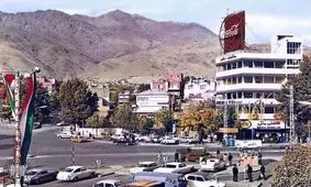 سفر به تهران قدیم؛ نمایی از سرپل تجریش در یک روز برفی؛ سال 1363