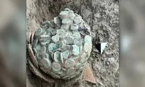 کشف سکه‌های سبزشده در «تپه مردگان»‌