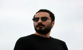 نوید محمدزاده؛ توقیف از بالا و فحش از پایین