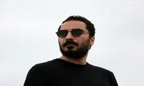 نوید محمدزاده؛ توقیف از بالا و فحش از پایین