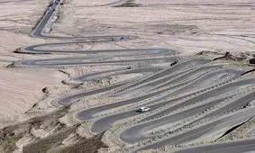 جاده‌ای عجیب شبیه اژدها با ۲۰۰ پیچ!/ ویدئو و تصاویر