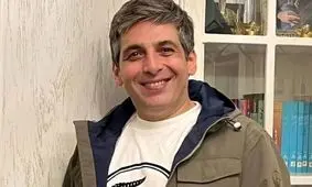 عکسی متفاوت از حمید گودرزی در سفر به هلند در کنار دوستش