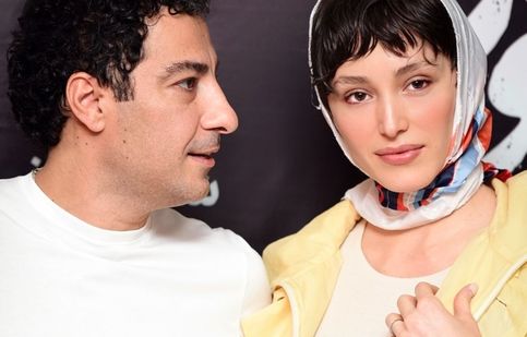 ژست‌های عاشقانه‌ فرشته حسینی و نوید محمدزاده مقابل عکاسان/ ویدئو