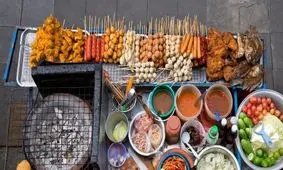  مهارت جالب آشپز هندی در آماده کردن یک غذای محلی در روغن داغ/ ویدئو