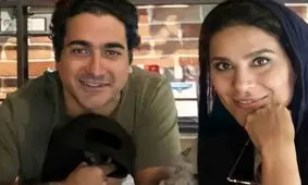 لحظه تقدیم گل به سحر دولتشاهی توسط همایون شجریان در کنسرت/ ویدئو