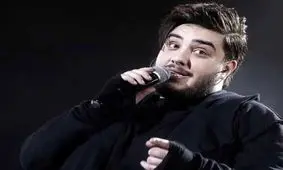 اجرای مشترک آرون افشار، پدر و برادرش در یک کنسرت/ ویدئو