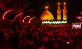 لحظه معنوی سرخ شدن چراغ‌های بین‌الحرمین همزمان با آغاز محرم/ ویدئو
