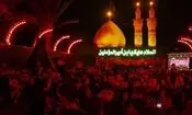 لحظه معنوی سرخ شدن چراغ‌های بین‌الحرمین همزمان با آغاز محرم/ ویدئو