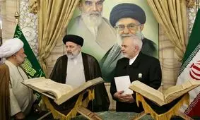 حضور و قرائت فاتحه ظریف بر مزار شهید رئیسی در حرم امام رضا(ع)/ عکس

