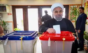 حسن روحانی رأی خود را به صندوق انداخت/ عکس

