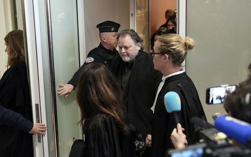 French filmmaker Christophe Ruggia leaves the courtroom in Paris, Monday, Feb. 3, 2025, after he was found guilty of sexual assault 