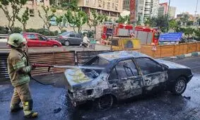آتش‌سوزی یک خودرو در بزرگراه مدرس تهران؛ ۲ سرنشین مصدوم شدند