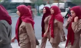 ماجرای حضور زنانی با لباس منافقین در تهران چیست؟/ ویدئو

